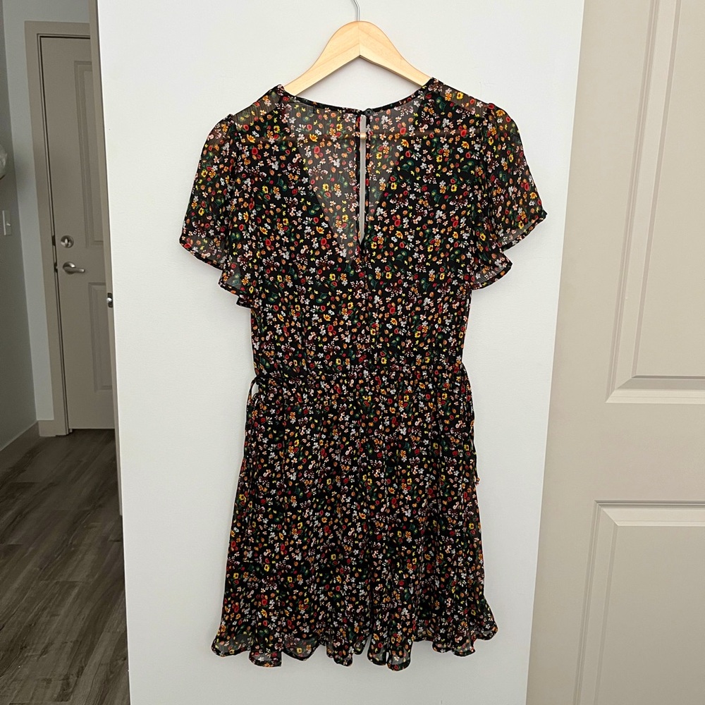 Boutique black dress with floral pattern
